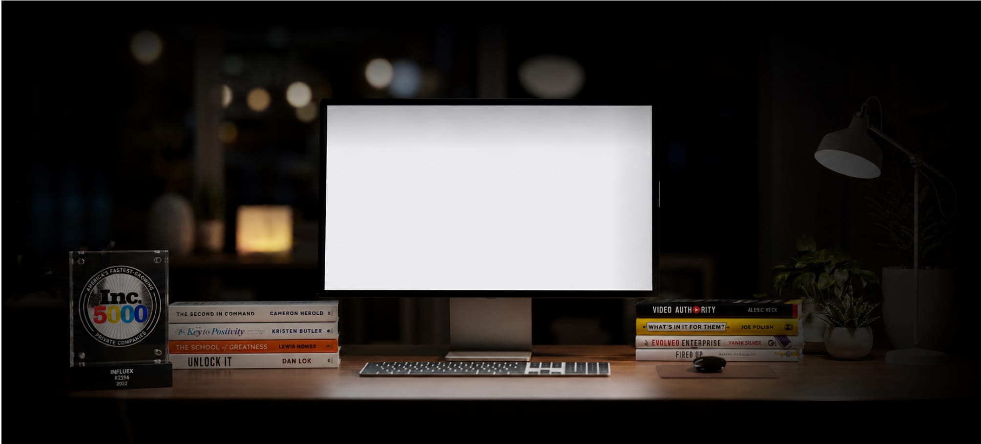 A desktop monitor on a wooden desk